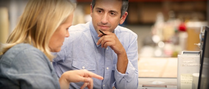 meeting-in-warehouse-pointing.jpg